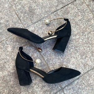 Elegant Black Women's Heels with Gold Accents